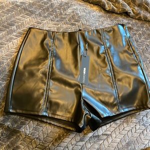 Black faux leather shorts from fashion nova size XL never worn